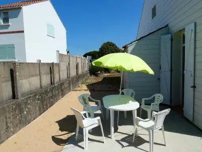 Maison à Notre Dame de Monts, Charmante maison avec jardin près plage pour 4 pers. - L1071592