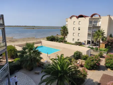 Appartement à Gruissan, Gruissan : T3 Pieds dans l'eau, Piscine, Parking, 6/7 pers, Confort Moderne - L1075284