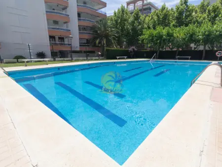 Appartement à Salou, Bel appartement à Salou, 5 pers., proche plage, avec piscine et climatisation - L1075282