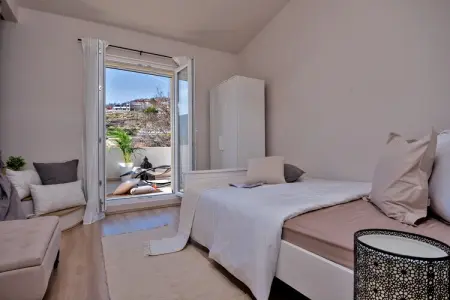 Villa Le Lu, Villa à Žrnovnica avec piscine chauffée - Photo 19
