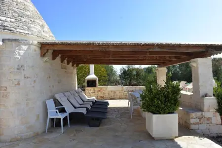 holiday home Cisternino-Trullo Ulivo Antico, Trulli à Valle d'Itra avec piscine et vue - Photo 2