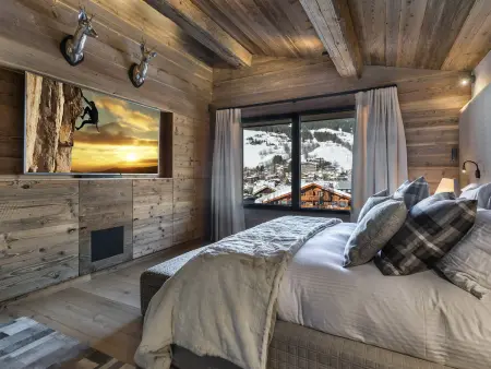 Chalet de luxe avec jacuzzi, salle cinéma et piscine au centre de Megève - Photo 11