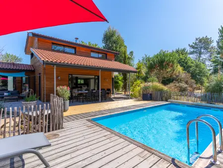 Villa familiale 10 pers. à Biscarrosse avec piscine chauffée, près du lac et des pistes cyclables - Photo 1