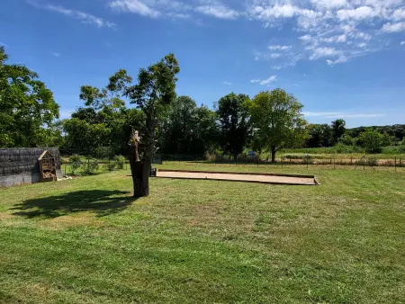 Maison rénovée avec jardin partagé de 2000m² à 1,3 km de la plage Clemenceau, idéale pour 4 personnes - Photo 10