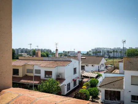 AT040 Clarà: Casa de 4 dormitorios con piscina comunitaria a 600 m de la playa - Photo 31