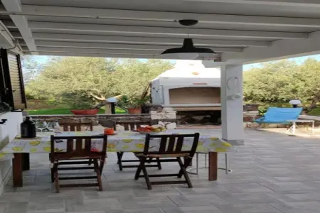Casa basalto uliveto, Casa su Rimediu à Orosei avec un jardin - Photo 12