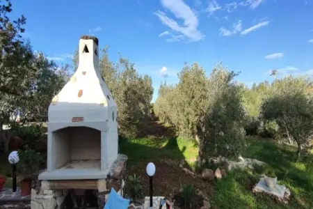 Casa basalto uliveto, Casa su Rimediu à Orosei avec un jardin - Photo 13