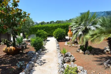 Trullo Cittadino Cisternino, Maison en Apulie avec piscine et terrasse - Photo 24