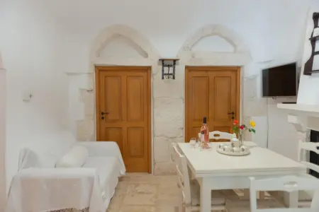 Trulli Azzalema Cisternino, Trulli dans la vallée d'Itria avec piscine - Photo 7