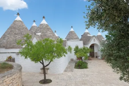Trulli Azzalema Cisternino, Trulli dans la vallée d'Itria avec piscine - Photo 45