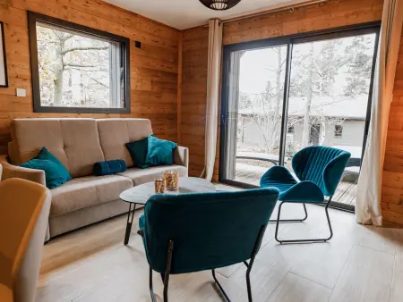 Lodge avec bain à remous privatif, piscine, salle de sport et aire de jeux au bord du golf de Chambon - Photo 4