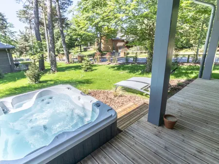 Lodge avec bain à remous privatif, piscine, salle de sport et aire de jeux au bord du golf de Chambon - Photo 9