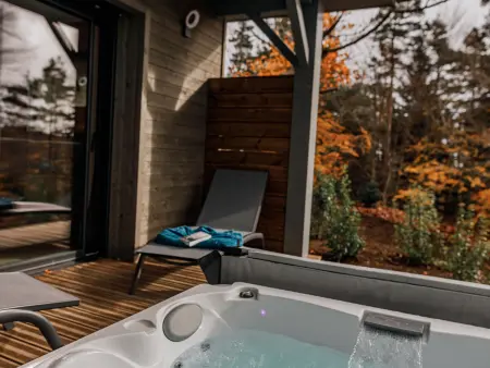 Lodge avec bain à remous privatif, piscine, salle de sport et aire de jeux au bord du golf de Chambon - Photo 10