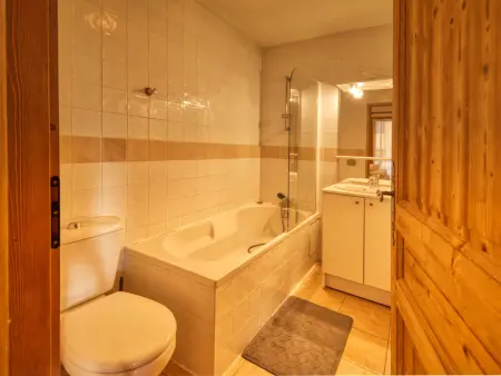 Appartement spacieux 4 chambres, pieds pistes, parking inclus - Photo 12