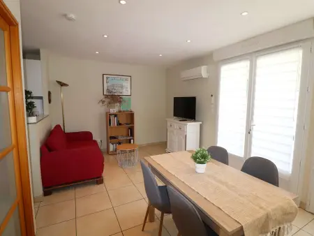 Appartement 2 pièces RDC avec terrasse, climatisation et parking proche plage et commerces - Photo 3