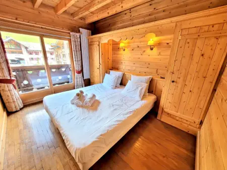 Charmant appartement 4 pièces au cœur des Gets avec balcon et parking - Photo 4