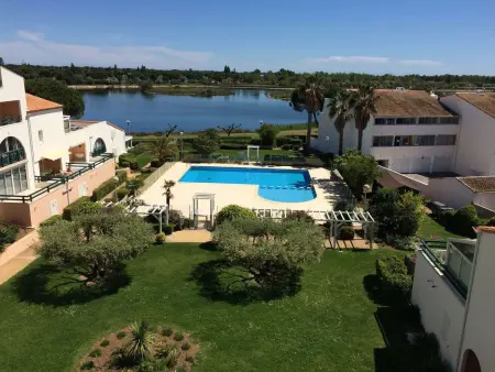 Appartement duplex 3 pièces avec piscine, climatisation et garage à Port Camargue - Photo 2