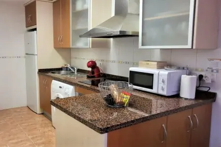 Bajo con terraza y acceso directo a piscina comunitaria, Appartement à Vera Playa près de la plage - Photo 13