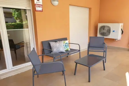 Bajo con terraza y acceso directo a piscina comunitaria, Appartement à Vera Playa près de la plage - Photo 28