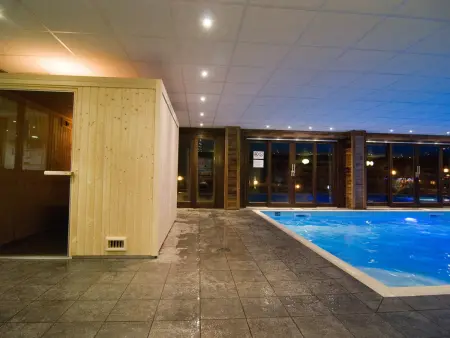 Appartement au pied des pistes avec piscine et parking - Photo 14