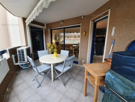 T2 climatisé au cœur de Cavalaire, avec terrasse, garage, proche des plages et commerces - Photo 1