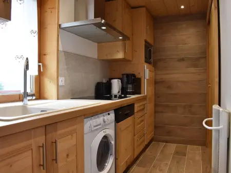 Appartement chaleureux 4 pièces, accès direct aux pistes, proche commerces et services, parking couvert - Photo 12