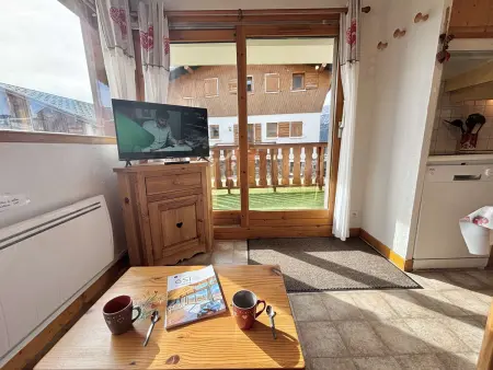 Appartement au pied des pistes avec terrasse, parking privé, casier à skis, proche commerces - Photo 11