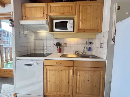 Appartement au pied des pistes avec terrasse, parking privé, casier à skis, proche commerces - Photo 12