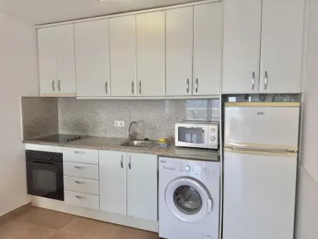Bel appartement avec piscine, climatisation et parking à 700m de la plage de Roses - Photo 8
