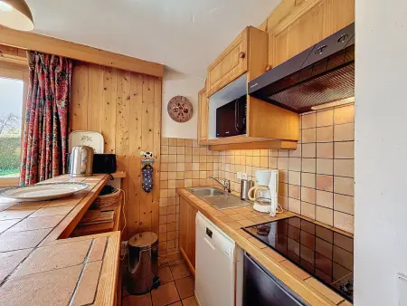 Appartement Mont Blanc : 2 chambres, terrasse, parking et équipements modernes - Photo 4